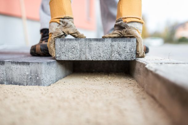 Paving stone is placed in a gap