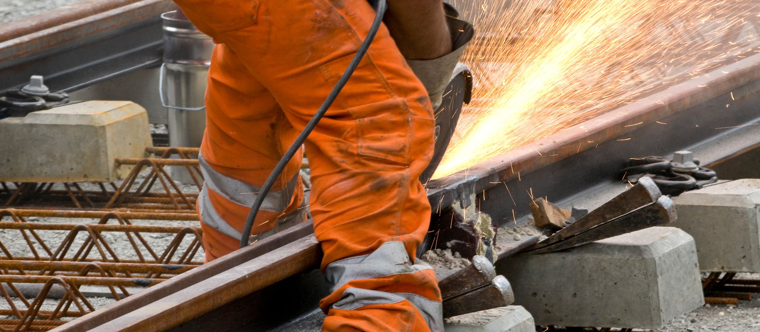 Person works on railway tracks